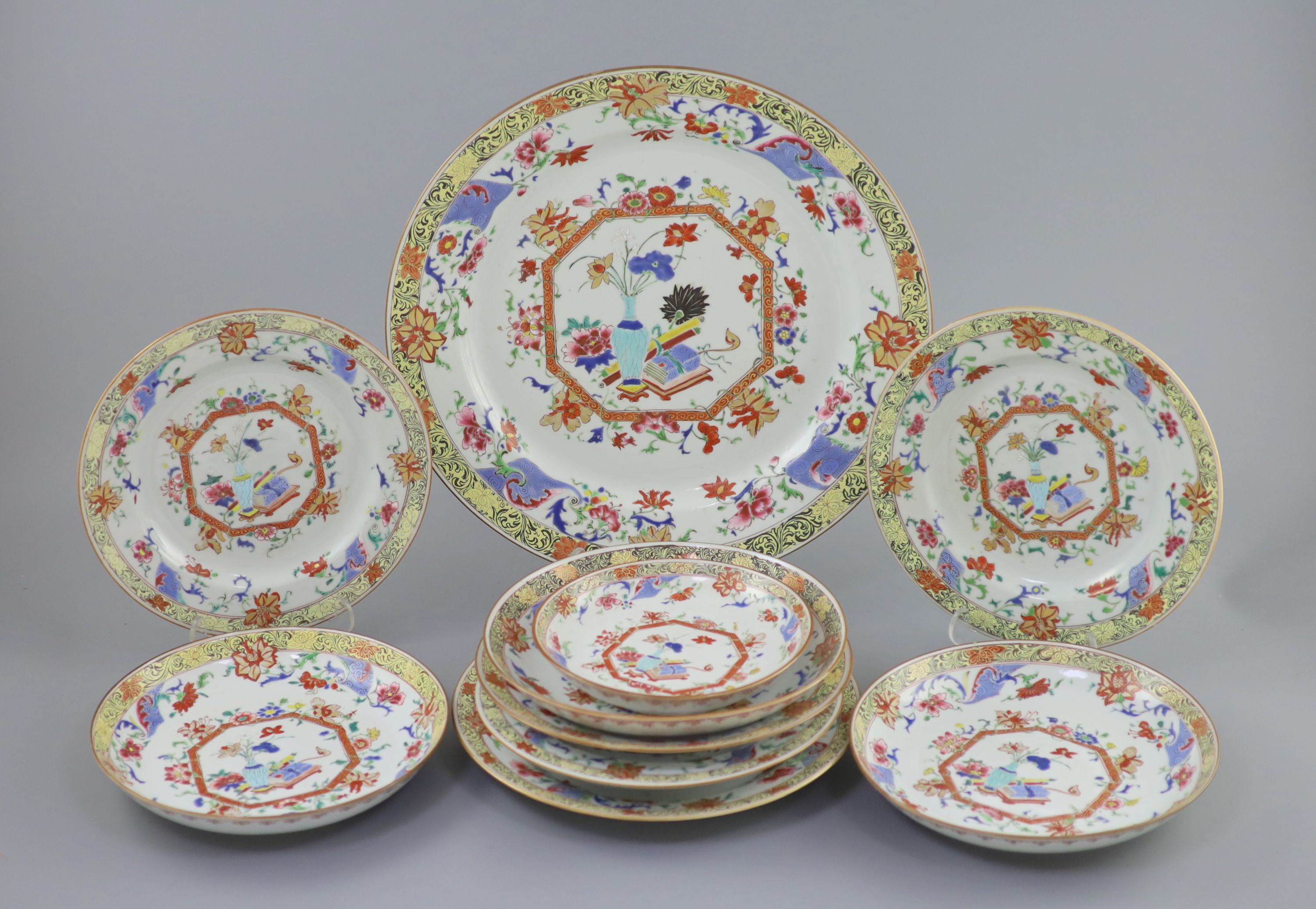 A suite of Qianlong famille rose porcelain: large dish and ten smaller dishes